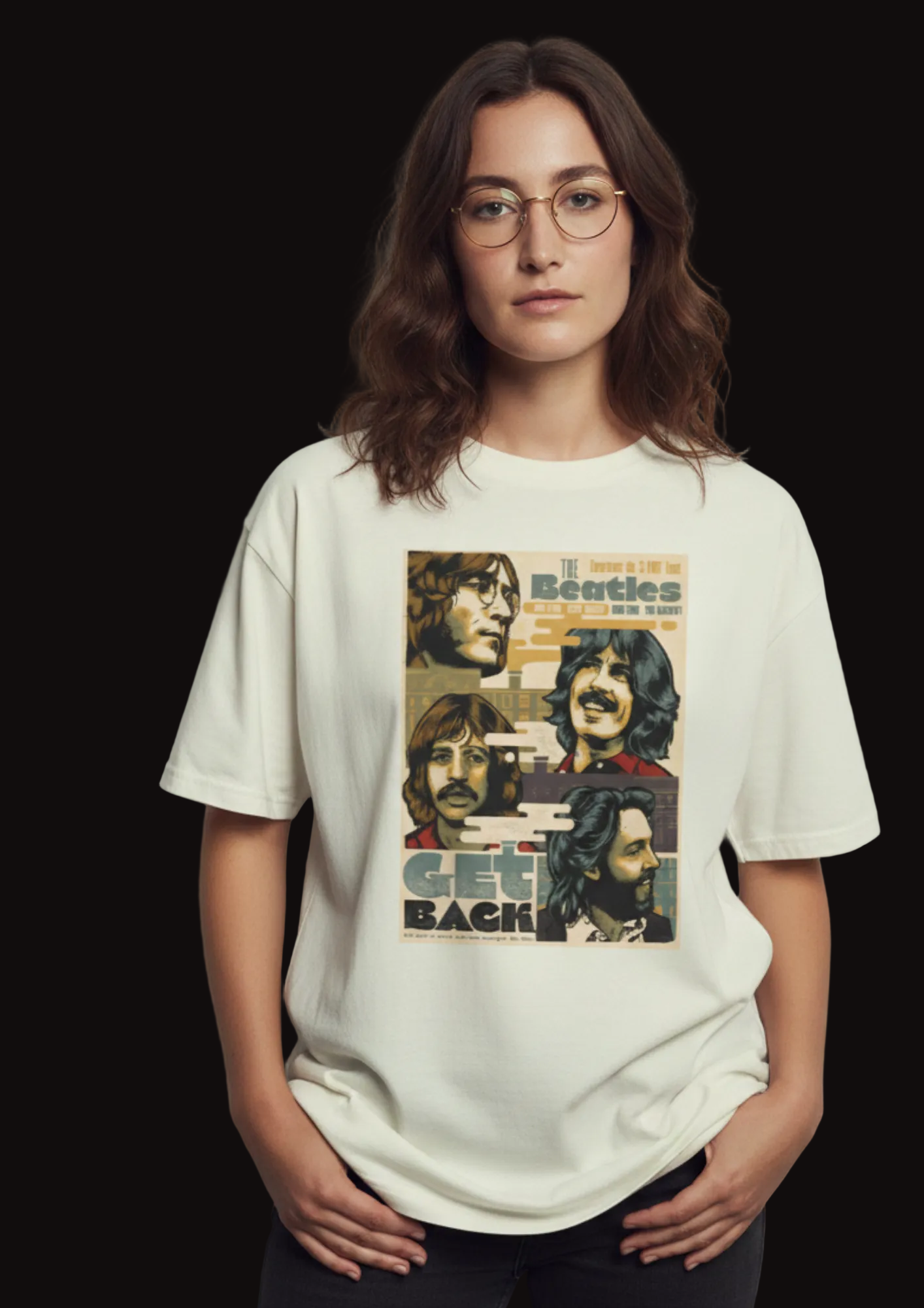 Person wearing a white t-shirt with a graphic of The Beatles on a plain background
