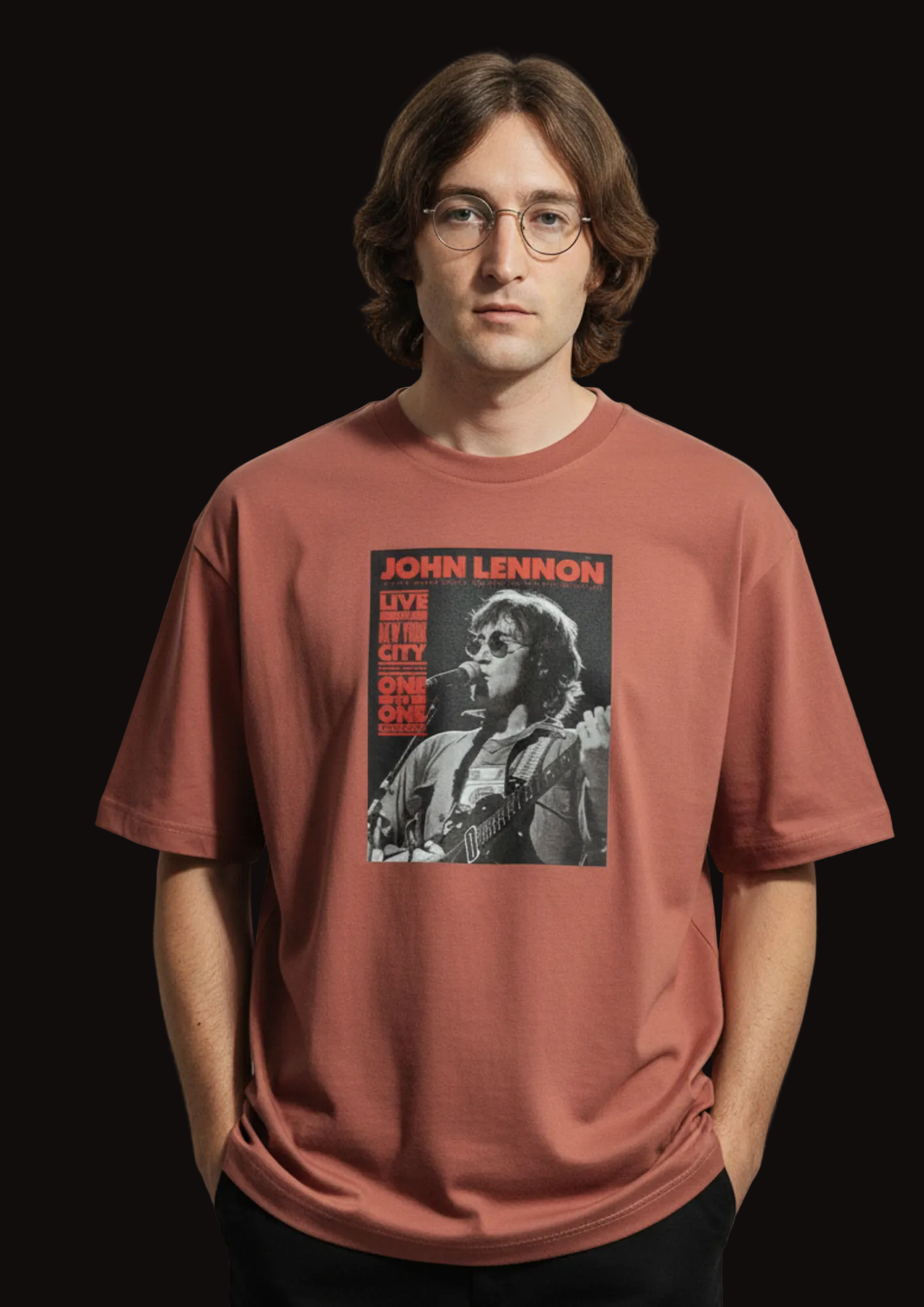 Person wearing a t-shirt with a graphic of John Lennon on a plain background