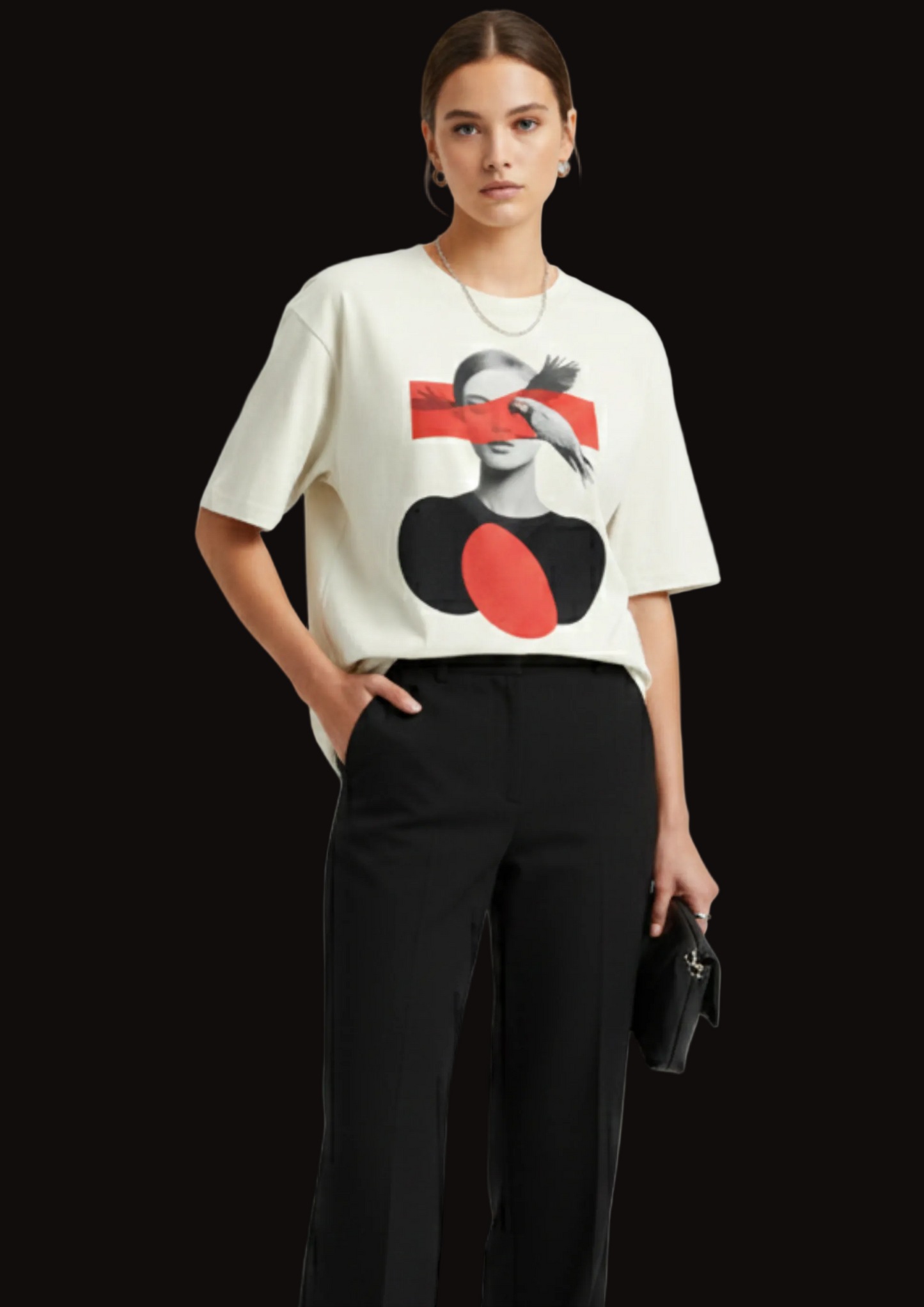 Person wearing a white sweater with a graphic design on a light gray background